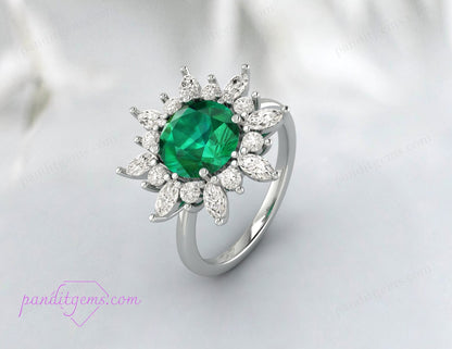 An elegant engagement ring with a round cut emerald, perfect for brides.