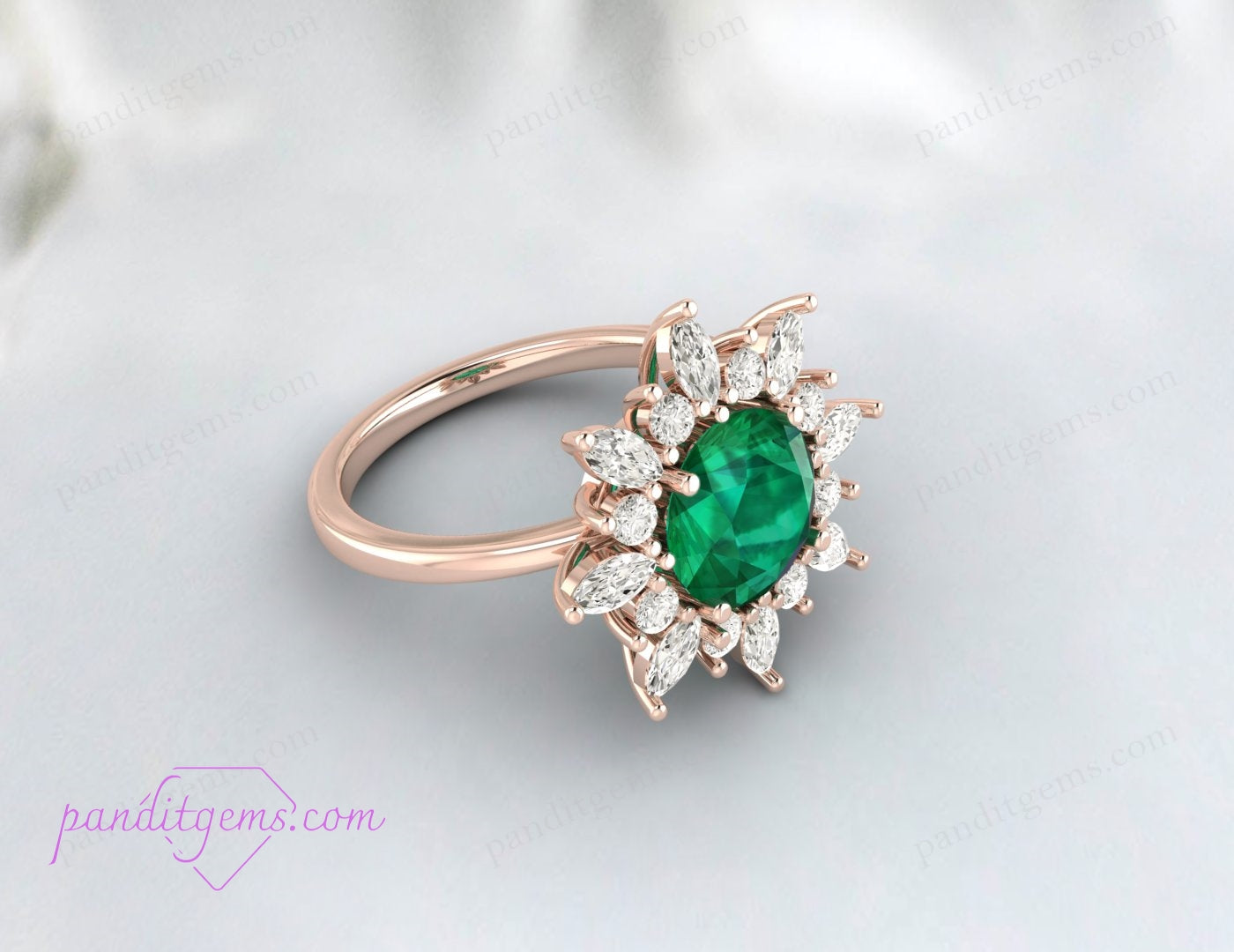 The halo anniversary ring with round cut emerald displayed elegantly on a ring stand.