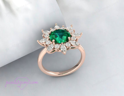 Emerald and marquise diamond snowflake halo ring