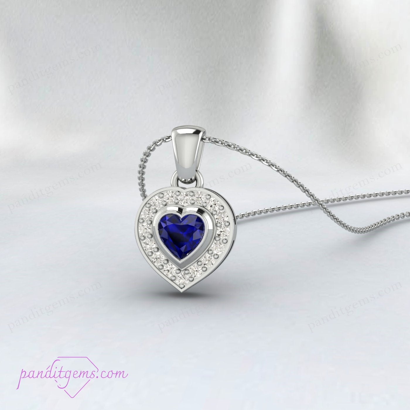 Front view of Blue Sapphire Heart Necklace with cubic zirconia in sterling silver.