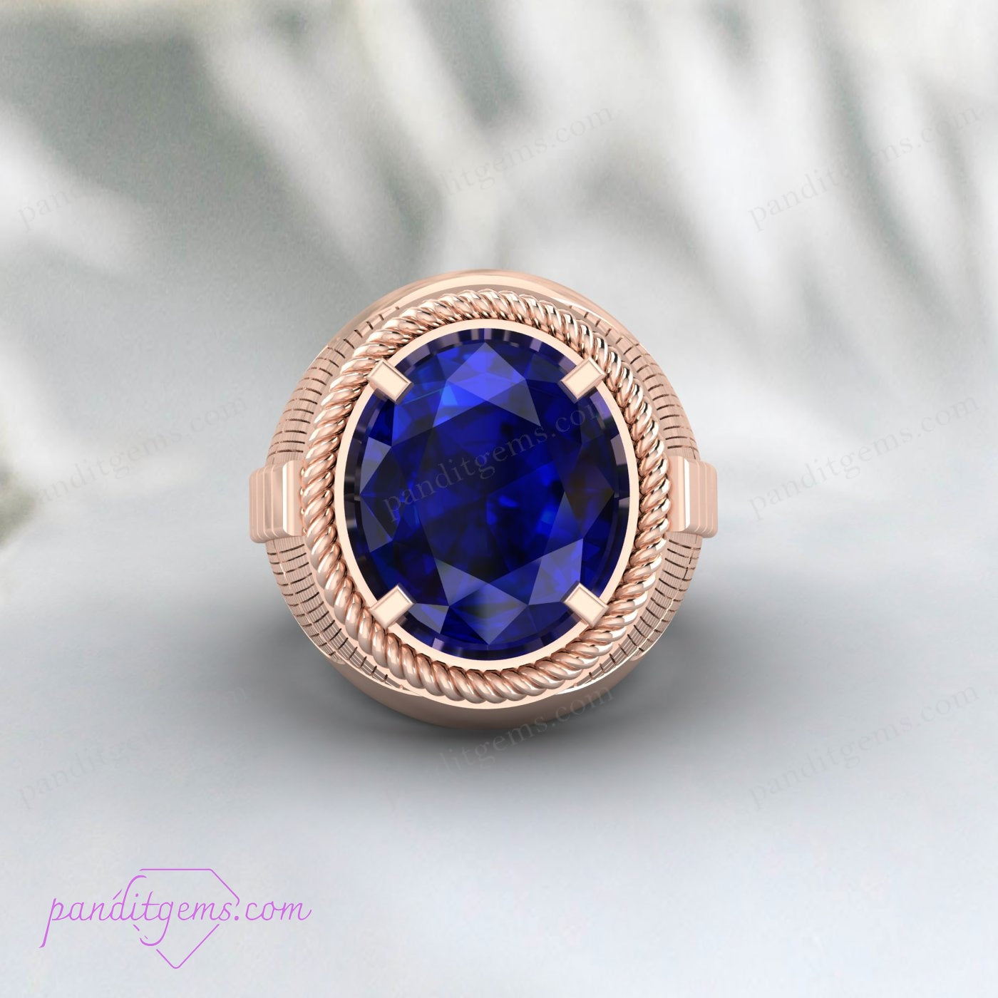 Greek-style sterling silver ring with a rich blue sapphire gemstone for men’s jewelry.