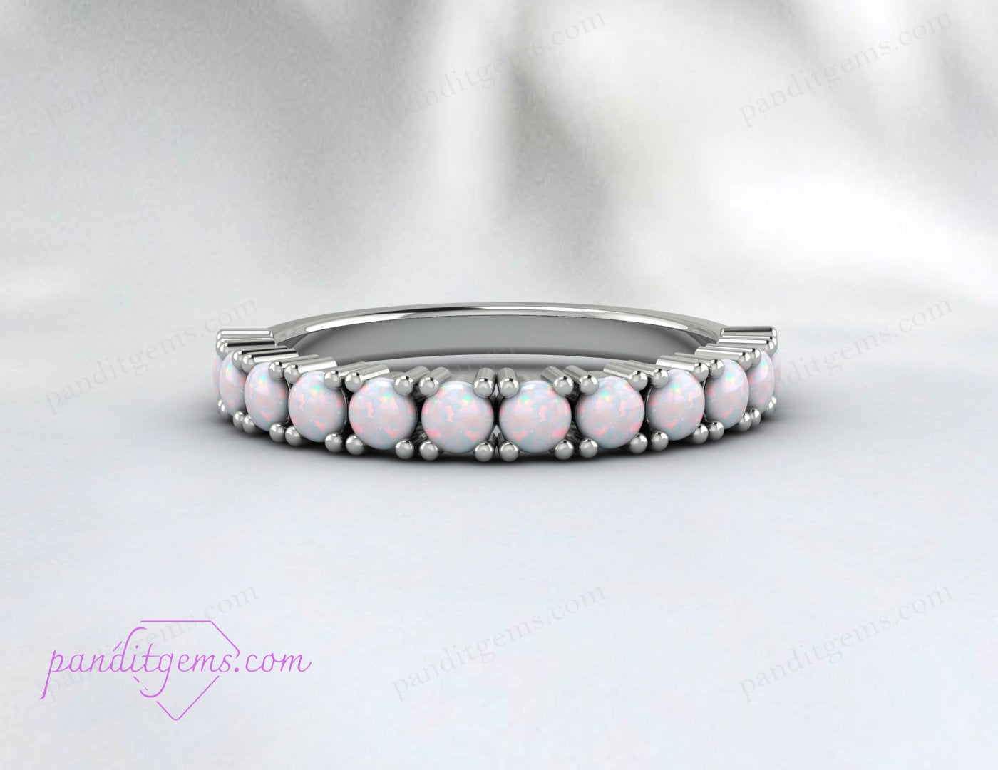 Half-eternity fire opal band with a minimalist design for everyday wear.
