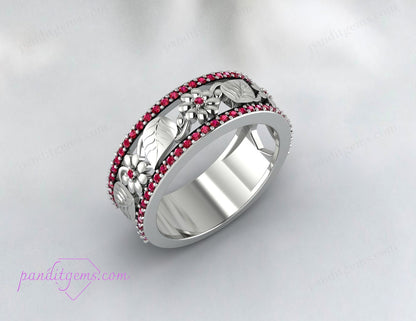 An image highlighting the handmade craftsmanship of the wedding band, featuring delicate floral and leaf details.