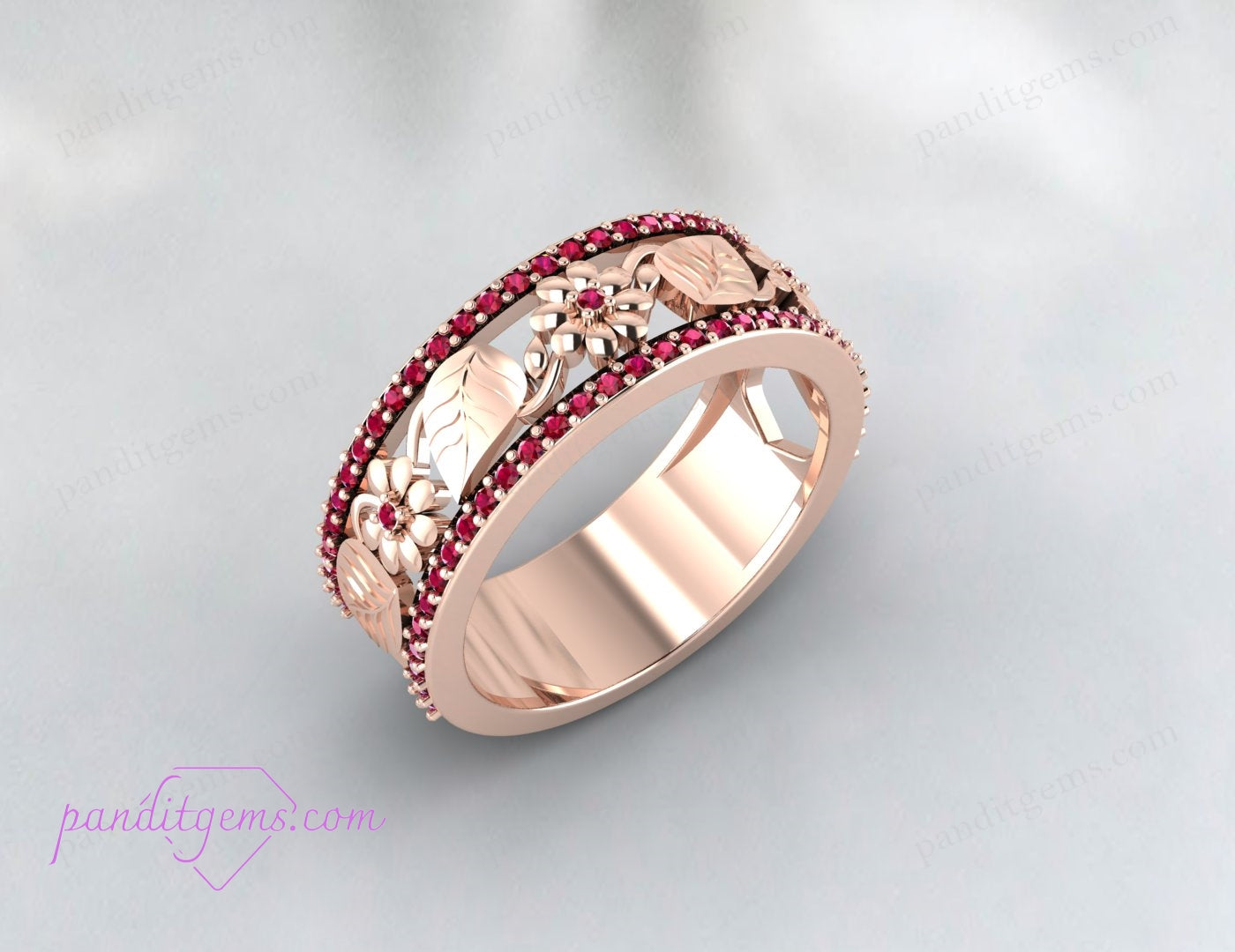 A pair of matching Rose Gold Ruby Leaf Wedding Bands, perfect for couples.