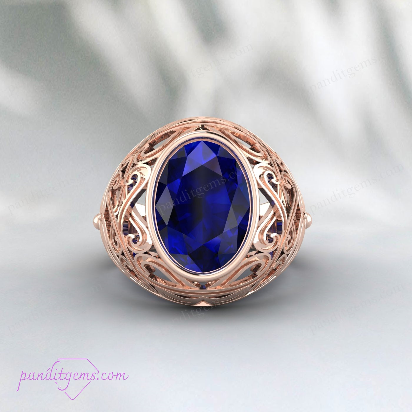 Men's Vintage Blue Sapphire Ring in sterling silver, with an oval sapphire and intricate filigree, perfect for special occasions.