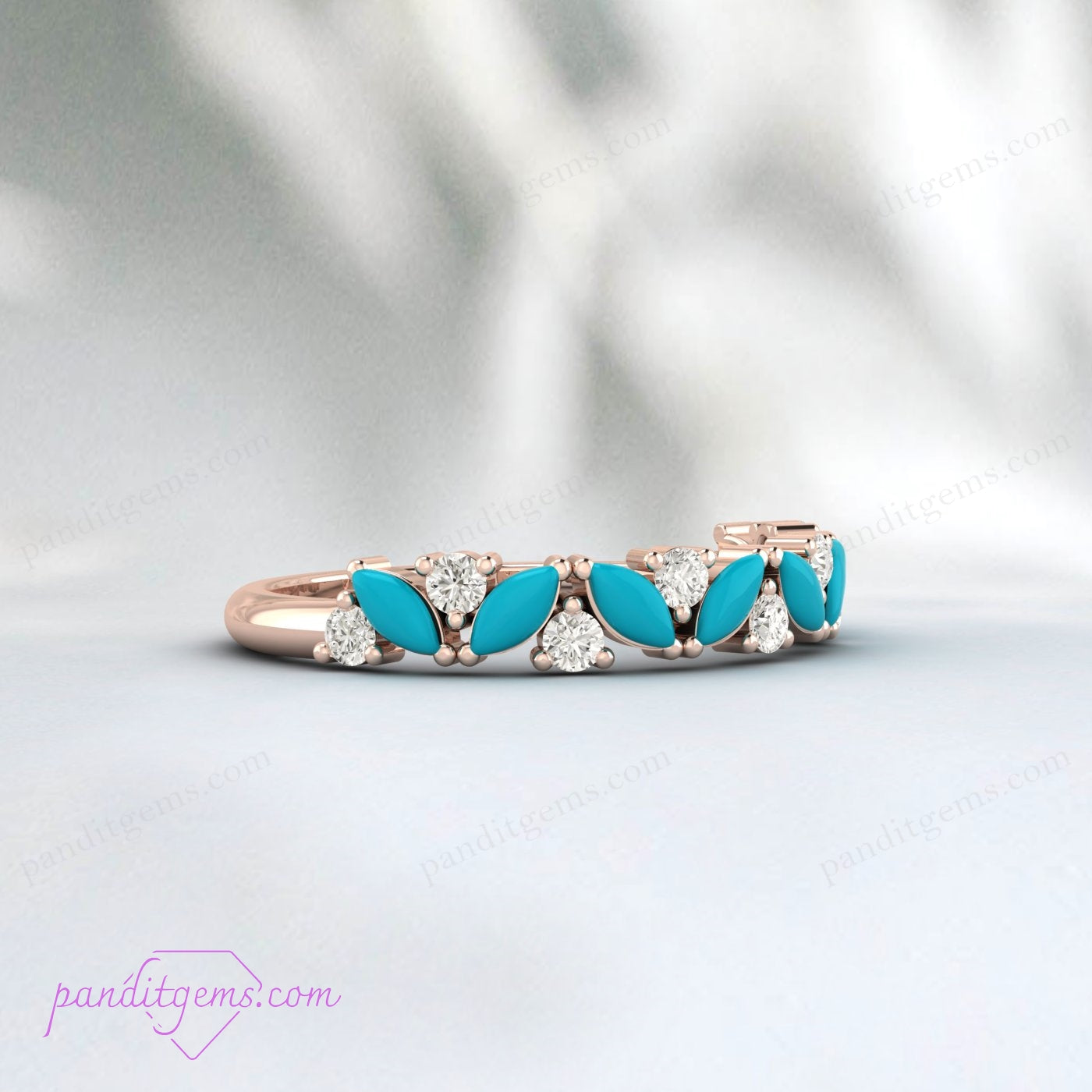 A minimalist turquoise wedding band showcasing an intricate filigree beaded design