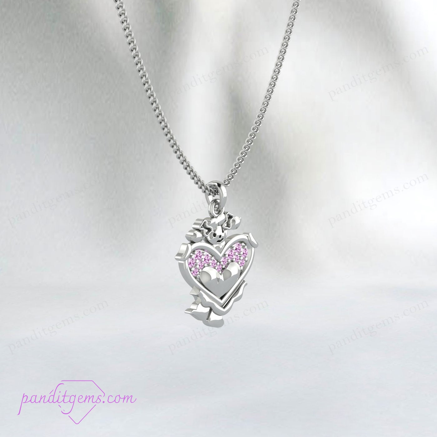 The pink sapphire heart pendant necklace displayed as a baby shower gift.