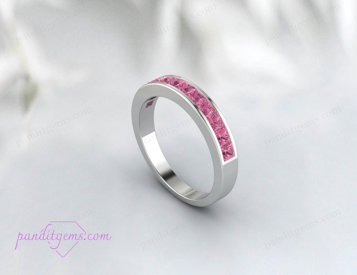 October birthstone gift: princess cut pink tourmaline ring.

