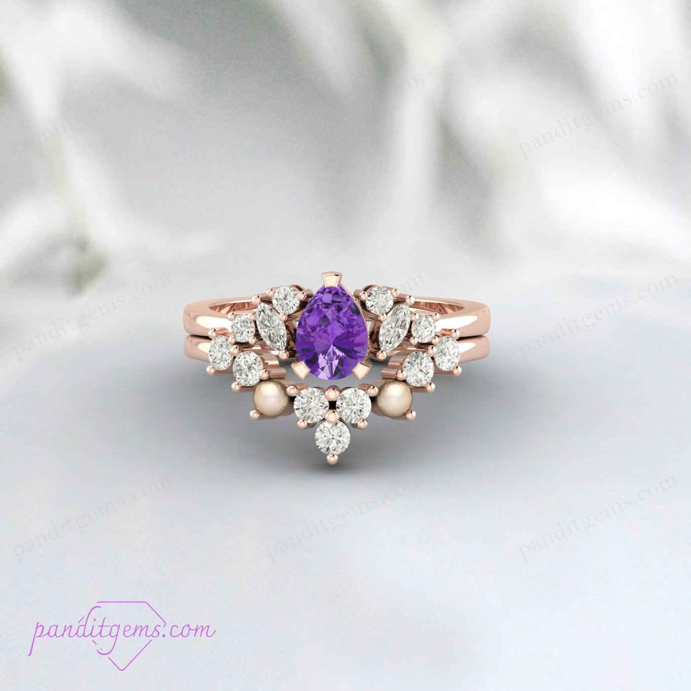 Pear-cut amethyst engagement ring with moissanite halo and pearl accents in sterling silver.