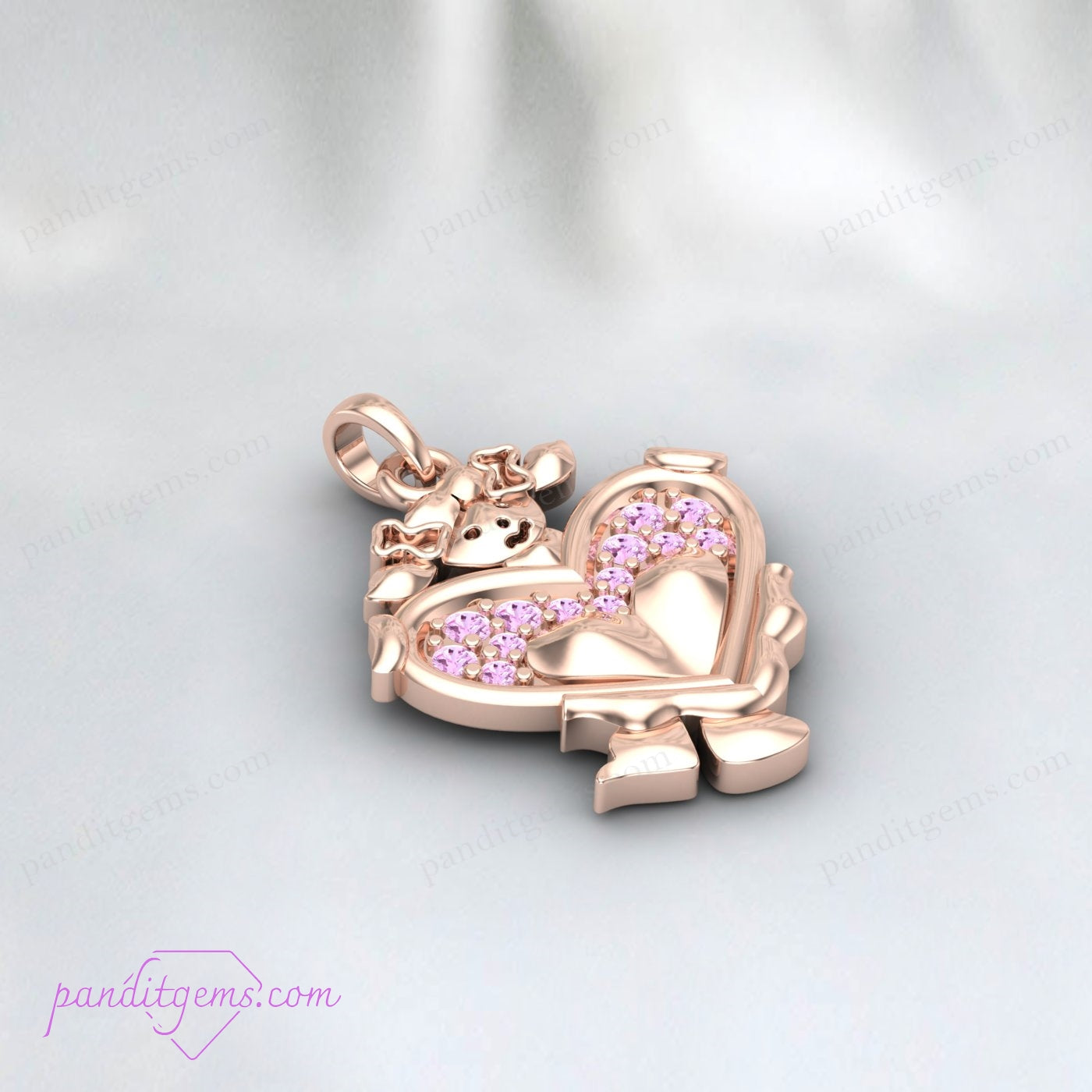 The pink sapphire heart pendant necklace presented in a luxurious gift box.