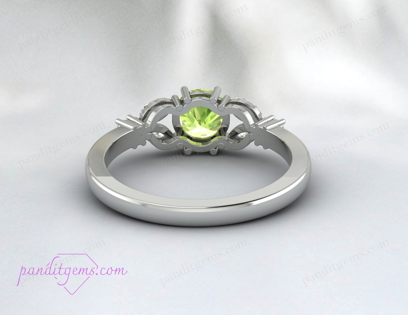 A dainty silver ring with a round peridot, perfect for August birthdays.