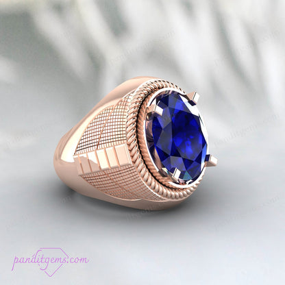 Personalized blue sapphire ring for men, showcasing natural blue gemstone in a shiny silver band.