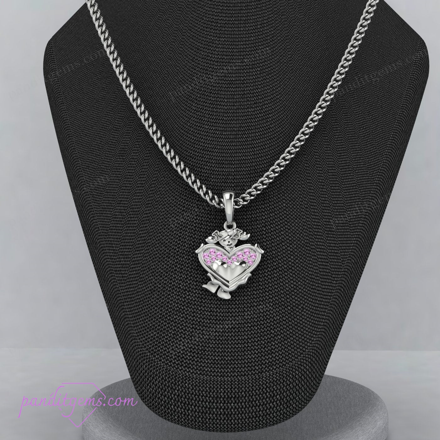 The pink sapphire heart pendant necklace shining in natural light.