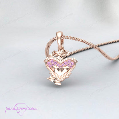 The pink sapphire heart pendant necklace featuring an additional baby charm.