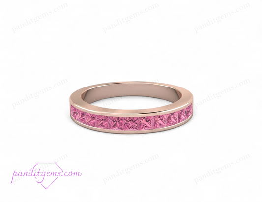 Pink tourmaline eternity band in 14K rose gold for wedding.
