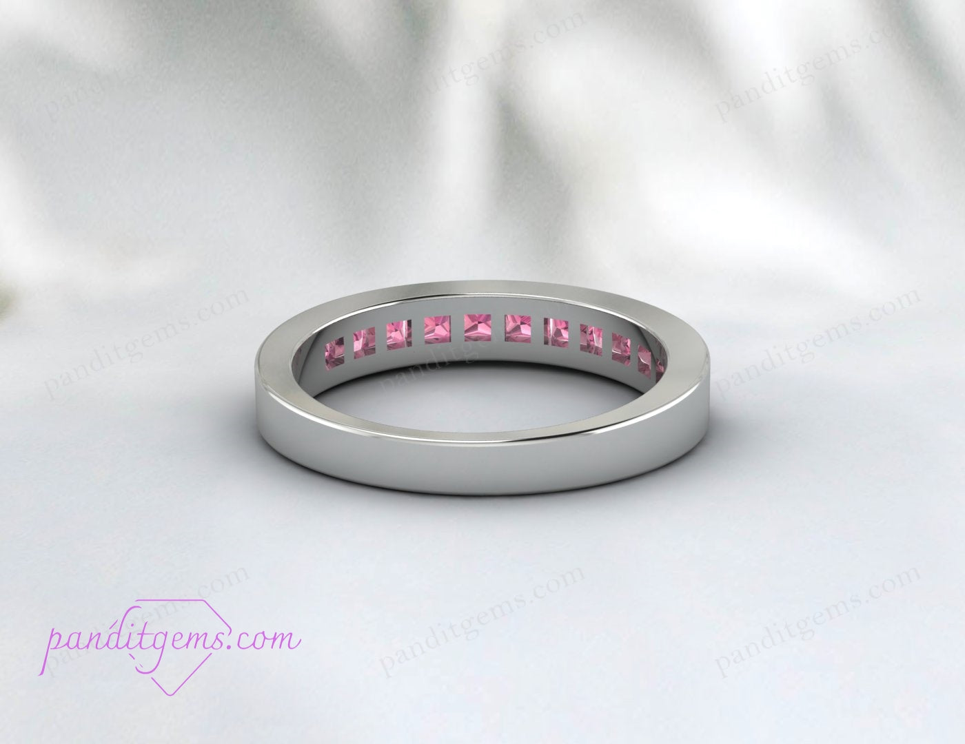 Pink tourmaline gemstone band for engagement or wedding.
