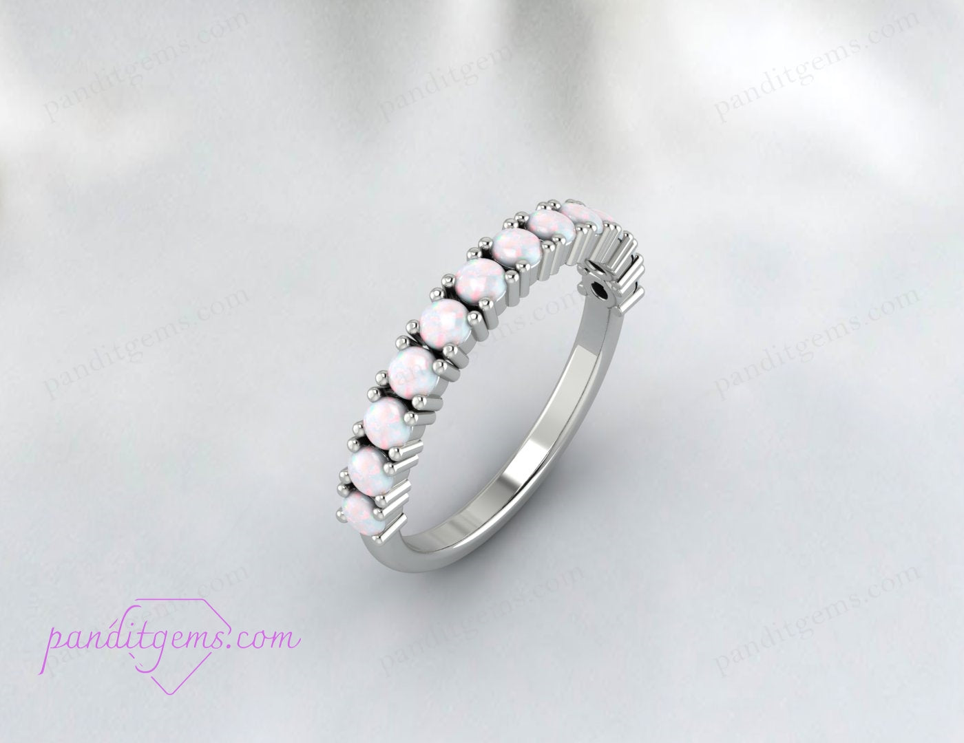 Rose gold opal engagement ring showcasing the October birthstone's natural brilliance.
