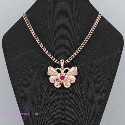 Ruby-adorned butterfly pendant necklace in sterling silver.