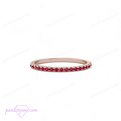 A white gold band set with sparkling 1.5mm natural rubies.