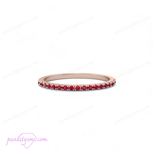 A white gold band set with sparkling 1.5mm natural rubies.