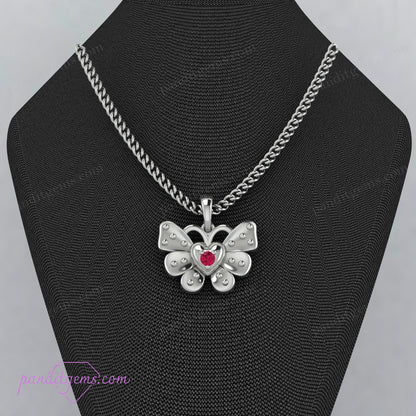 Ruby and silver butterfly charm on a delicate chain.