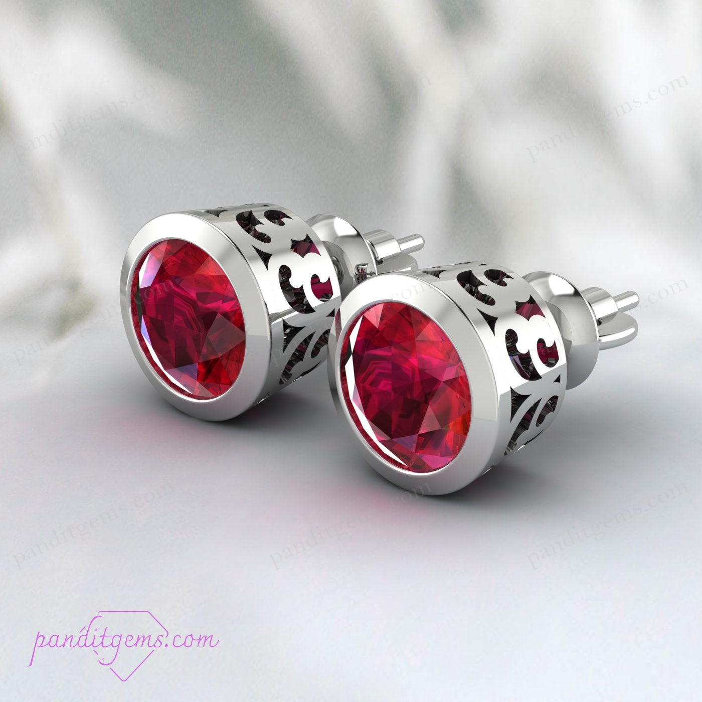 Ruby earrings with a double bezel setting, available in sterling silver.