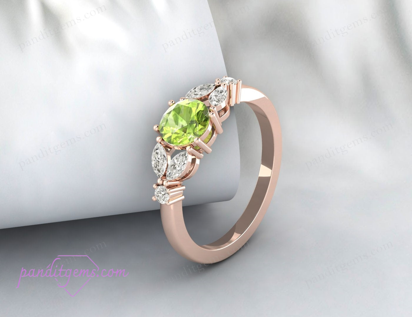 Side view showcasing the intricate leafy design and setting of the peridot and diamonds.