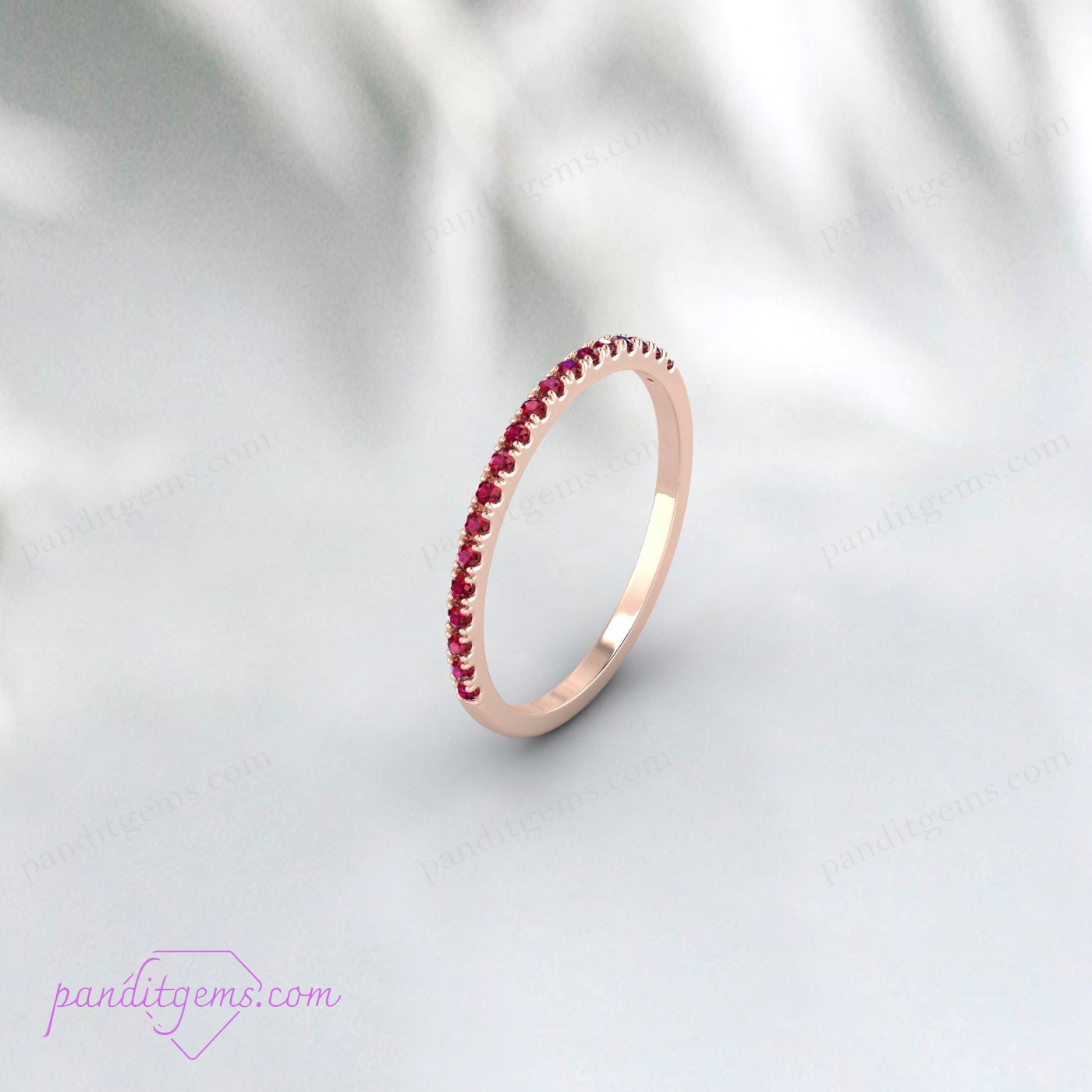 Side view of the white gold ruby wedding band.