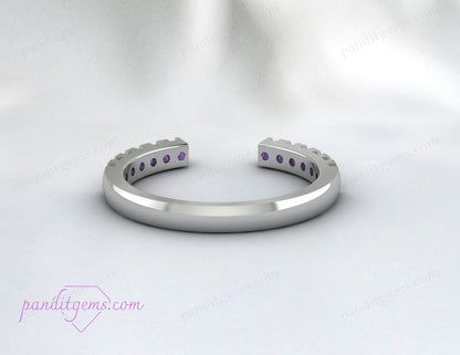 Side view of sterling silver open gap ring with round-cut amethyst gemstone.