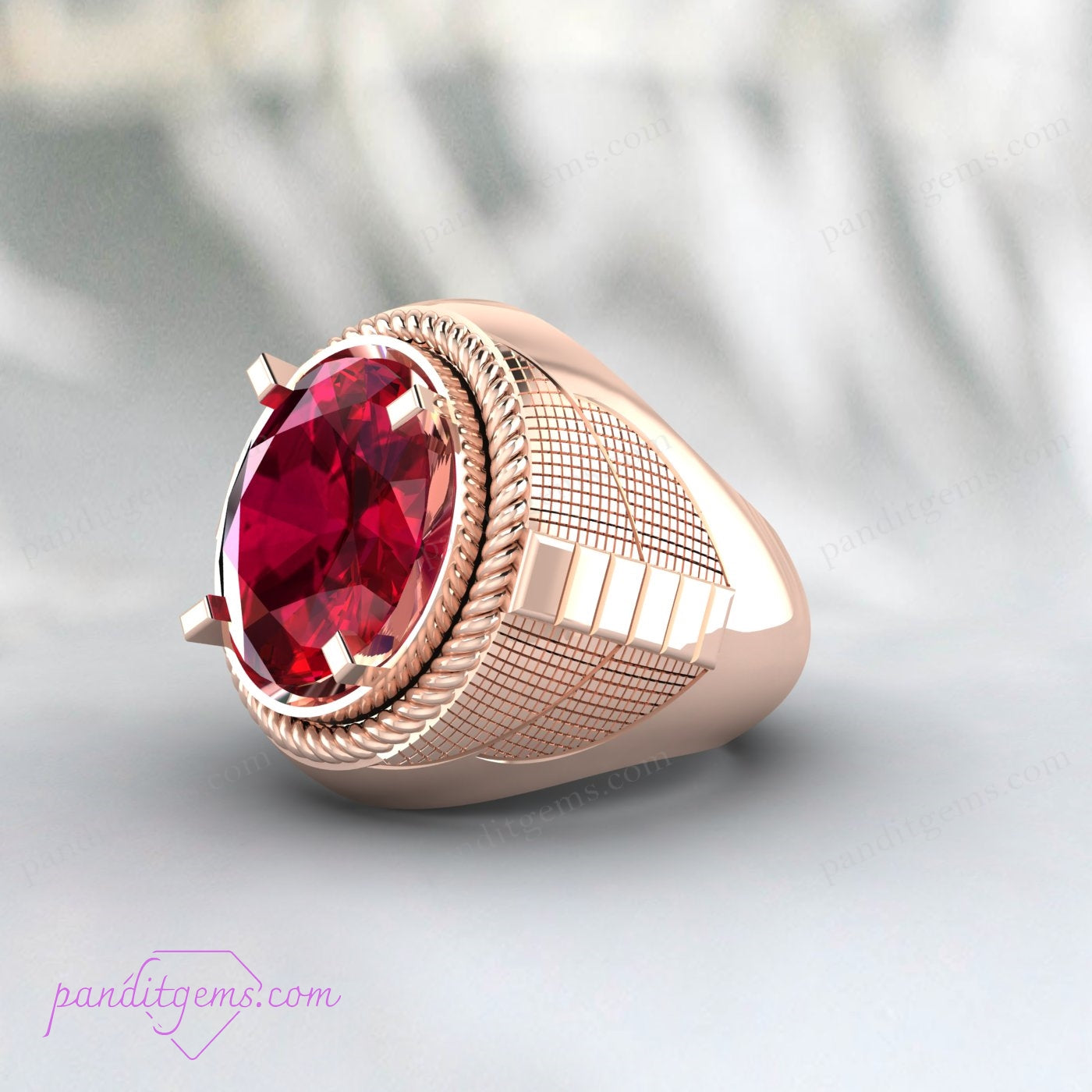 Antique signet ring in sterling silver featuring a vibrant ruby gemstone.