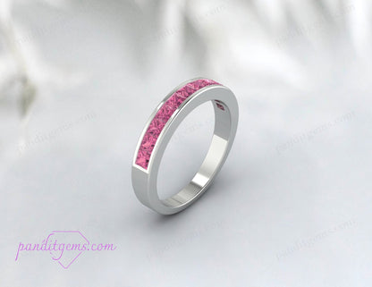 Sterling silver band with pink gemstones for special occasions.
