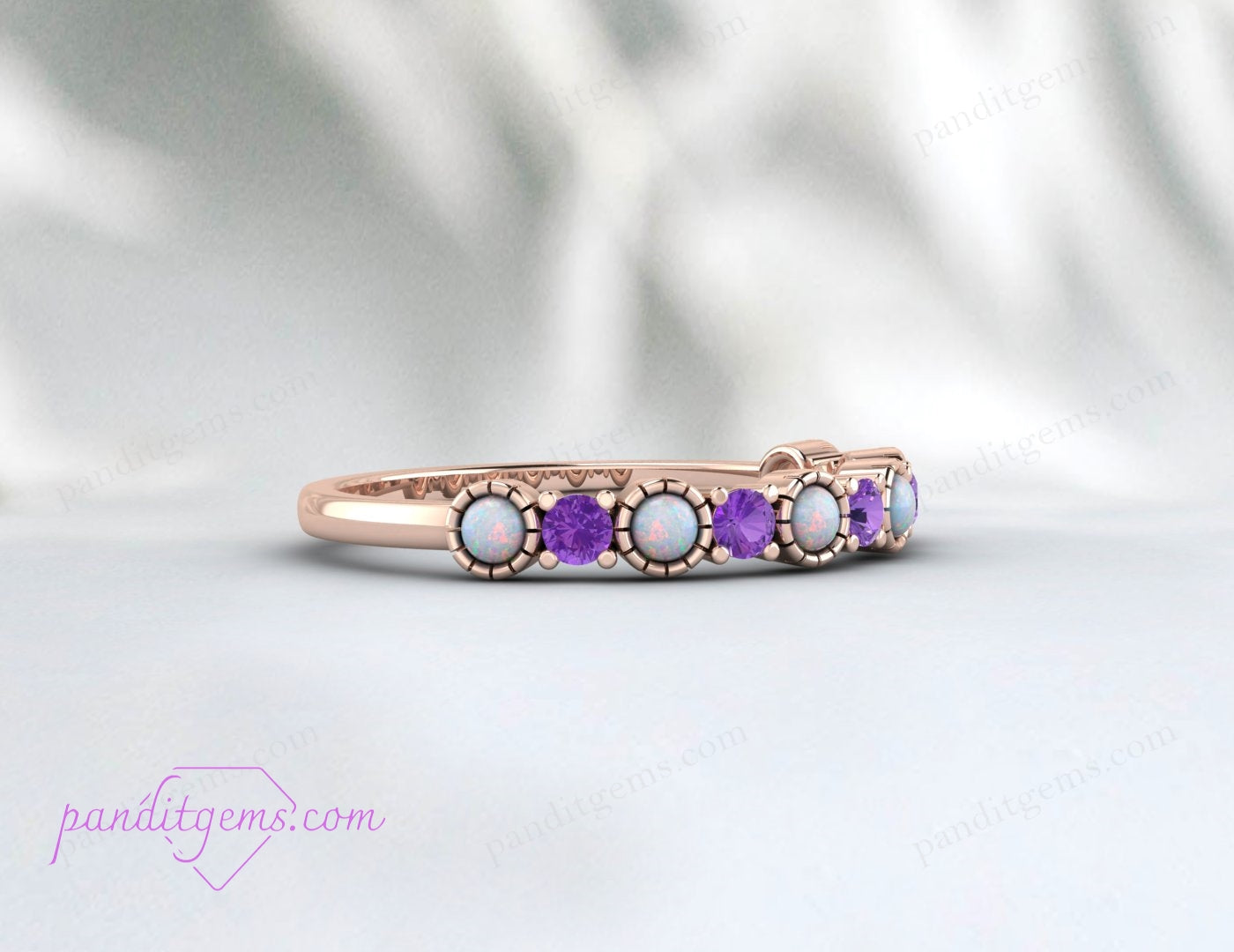 Sterling silver ring with round-cut amethyst and opal, ideal for minimalist or vintage-inspired styles.
