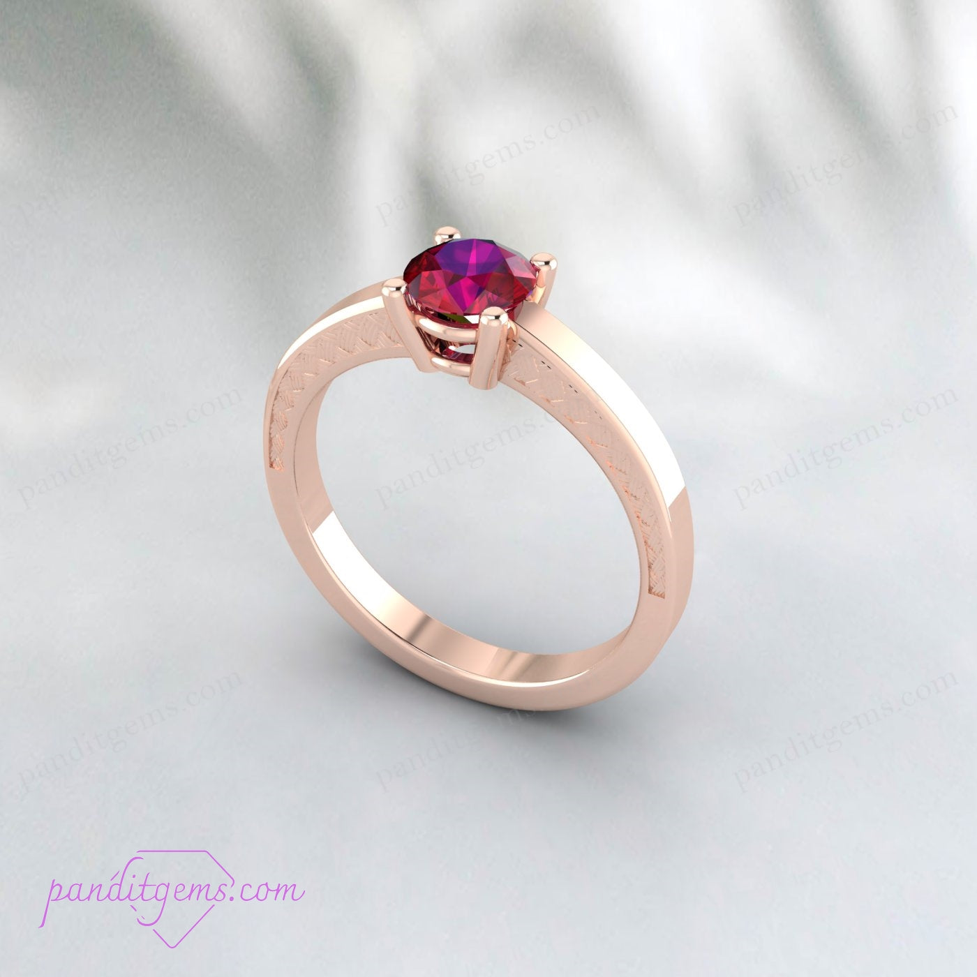 Sterling silver ruby promise ring with a floral design.