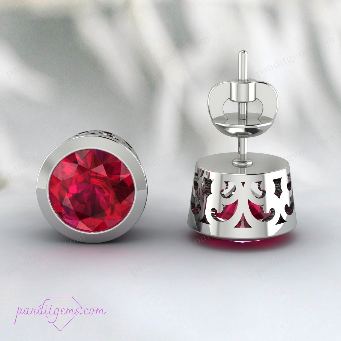 Unisex ruby stud earrings in sterling silver, ideal for weddings or anniversaries.