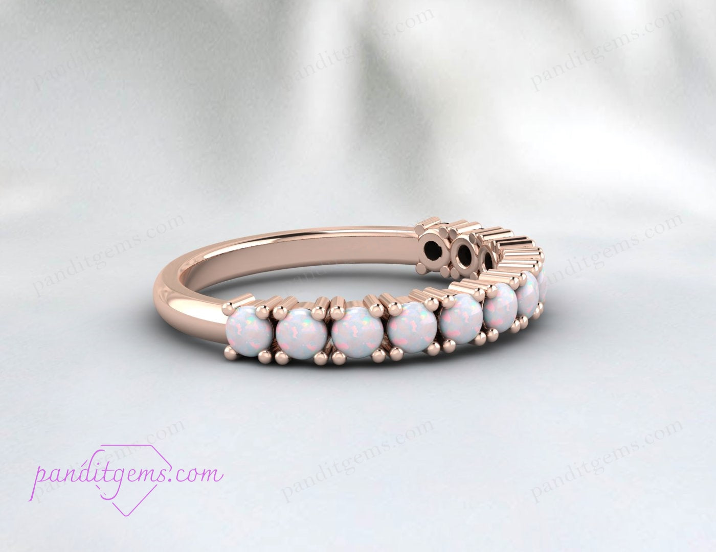 Vibrant fire opal band in rose gold, perfect as a stacking or anniversary ring.
