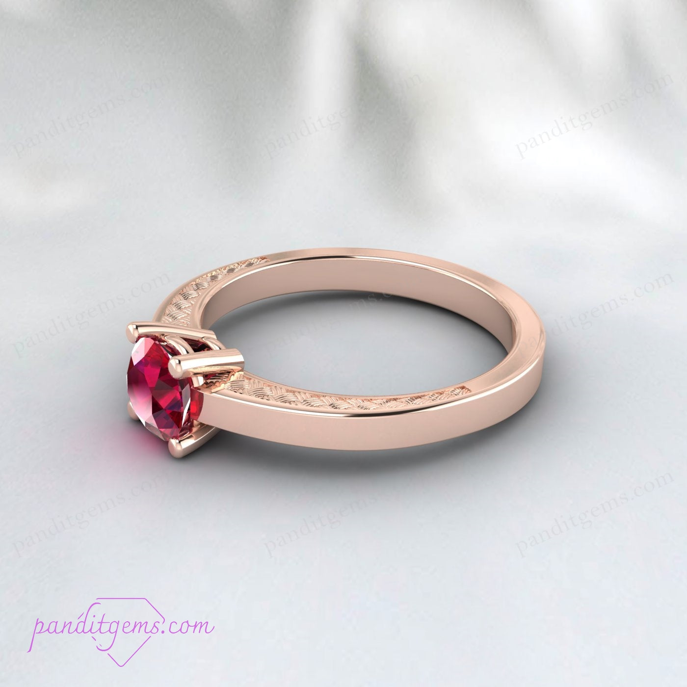 Victorian ruby engagement ring featuring a deep red gemstone.