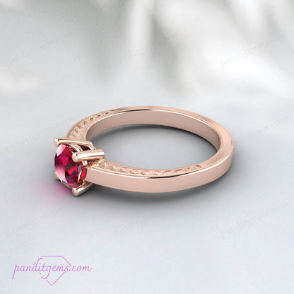 Victorian ruby engagement ring featuring a deep red gemstone.