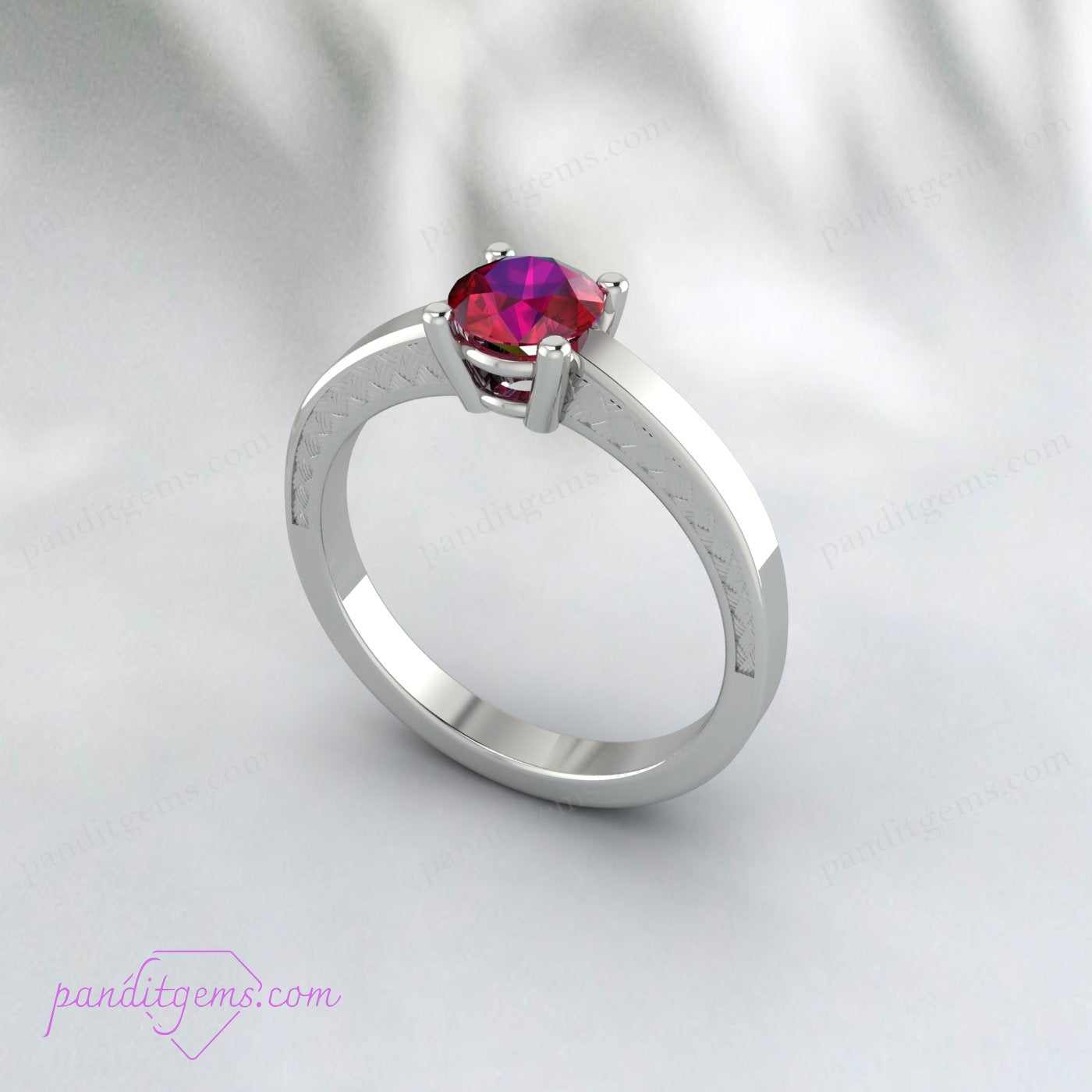 Victorian ruby ring with a round gemstone and gold-filled band.