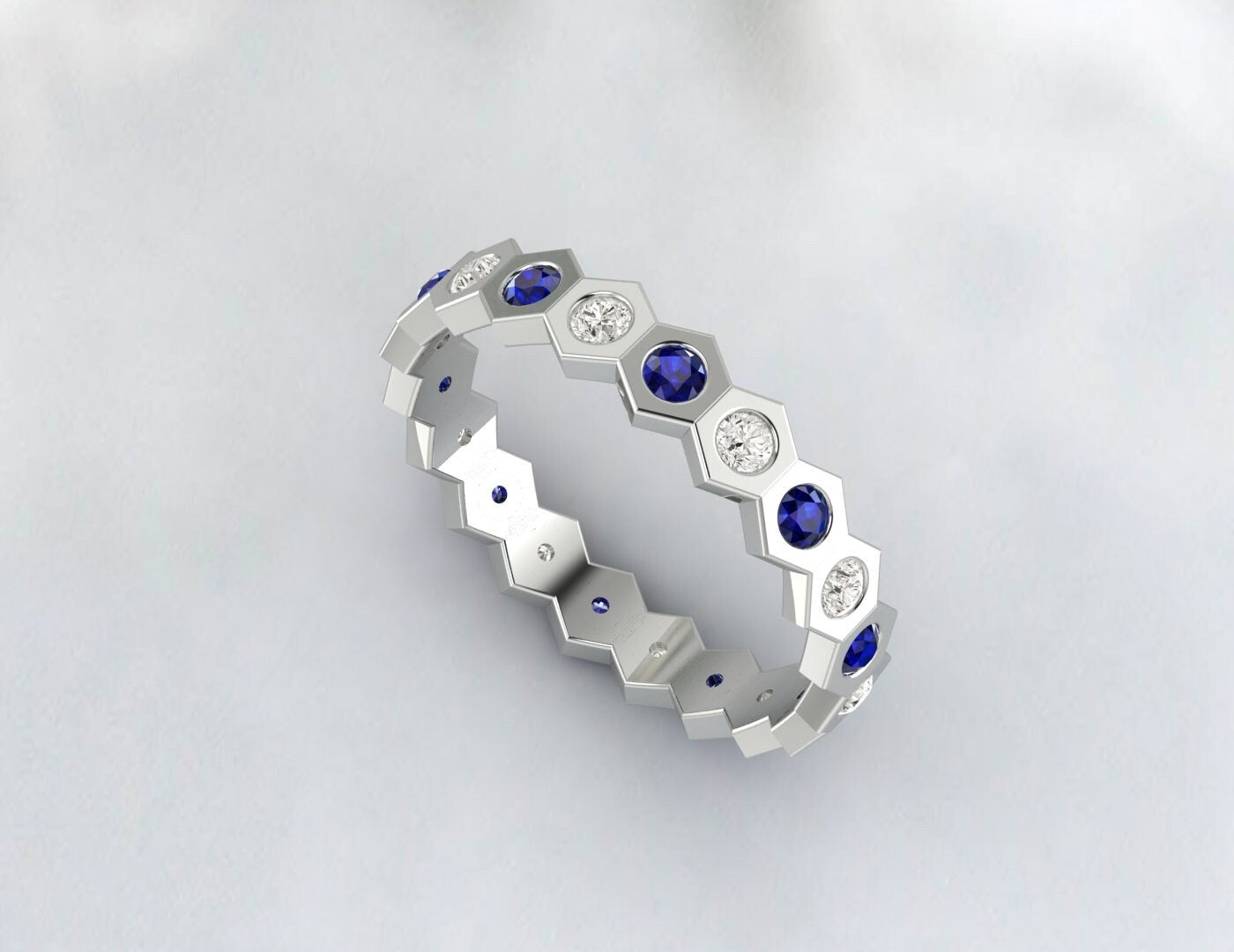 Alliance d'éternité en diamant et saphir bleu, style hexagonal