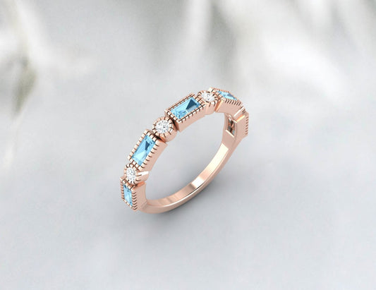 Aquamarinring im Baguetteschliff, halber Eternity-Diamant-Ehering