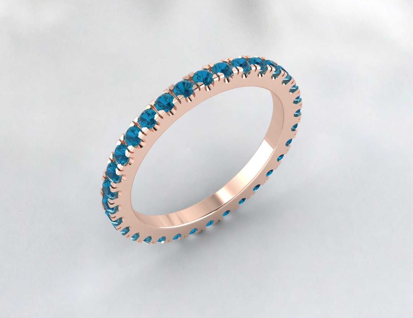 Bague de fiançailles ronde avec topaze bleue de Londres et éternité pour elle