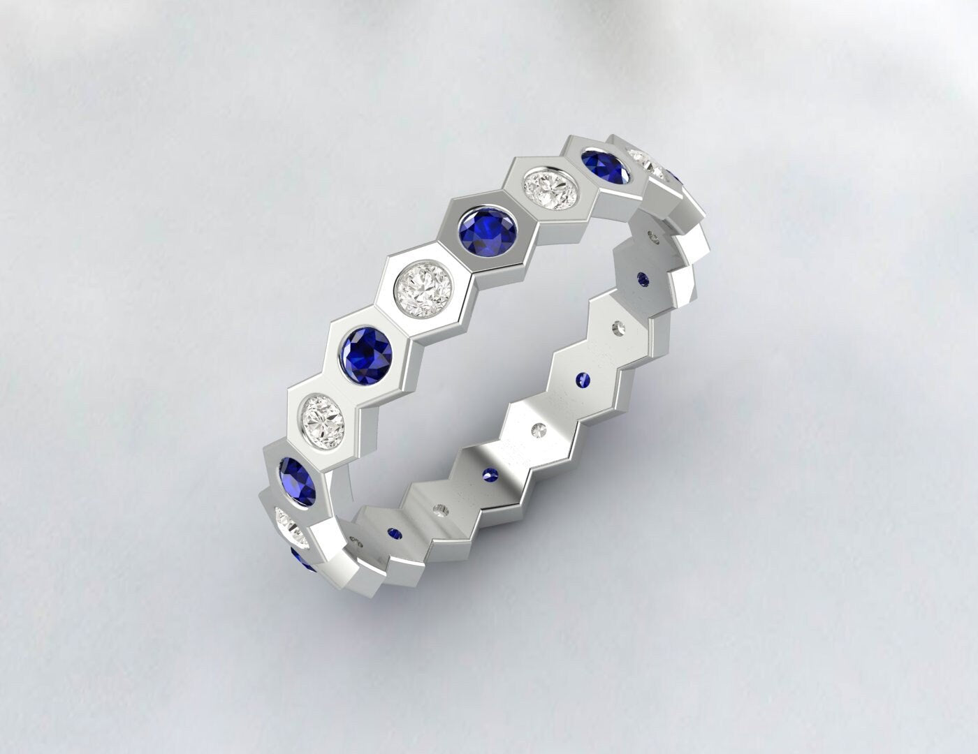 Alliance d'éternité en diamant et saphir bleu, style hexagonal