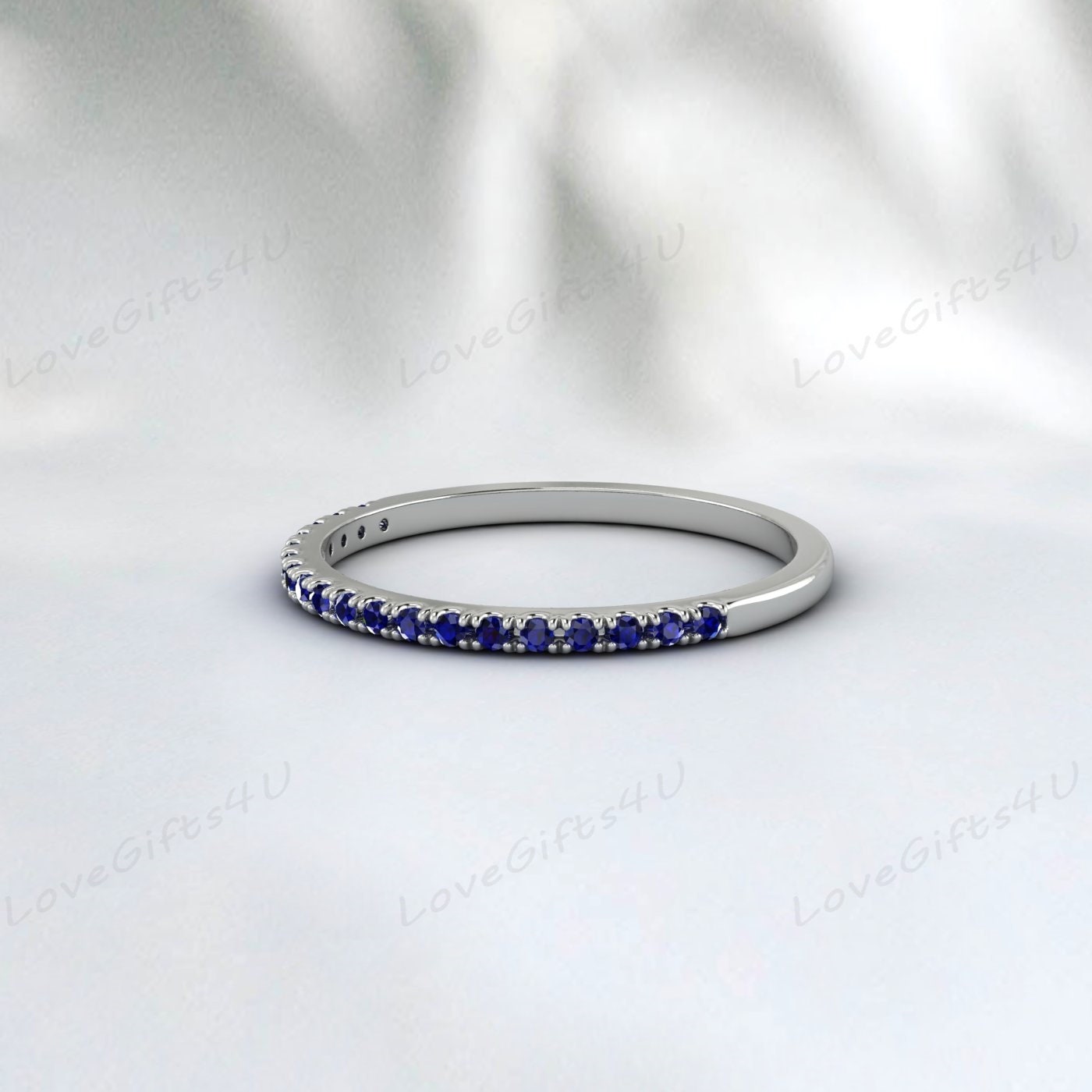 Bague d'anniversaire en argent avec bracelet d'éternité en saphir bleu