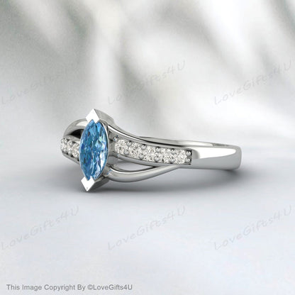 Bague de fiançailles en argent vermeil avec topaze bleu ciel taille marquise